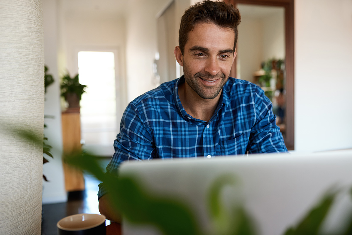 Man working from home on his laptop.